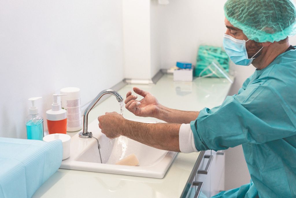 surgeon washing his hands before operating inside 2025 10 14 08 38 04 utc 1 scaled